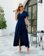 Elegant midnight navy classic crepe wrap formal evening dress, wrinkle-resistant V-neck maxi gown by ZZV Atelier. [Front view]