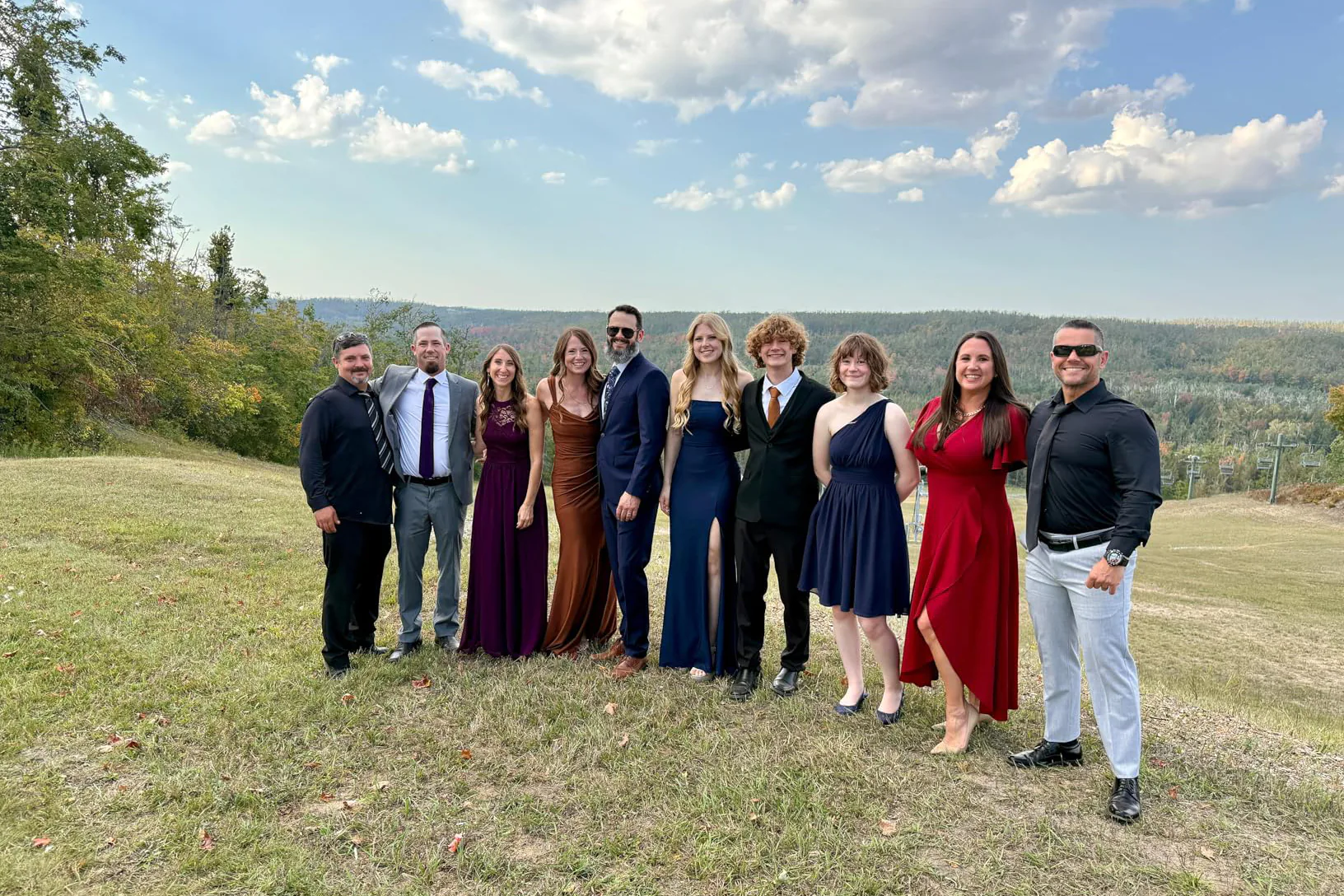 ZZV Atelier burgundy wrap maxi dress worn at an outdoor October wedding